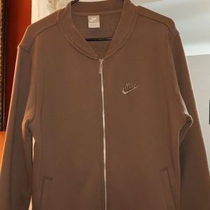 Nike men's olive tan Small sweater, fits big.